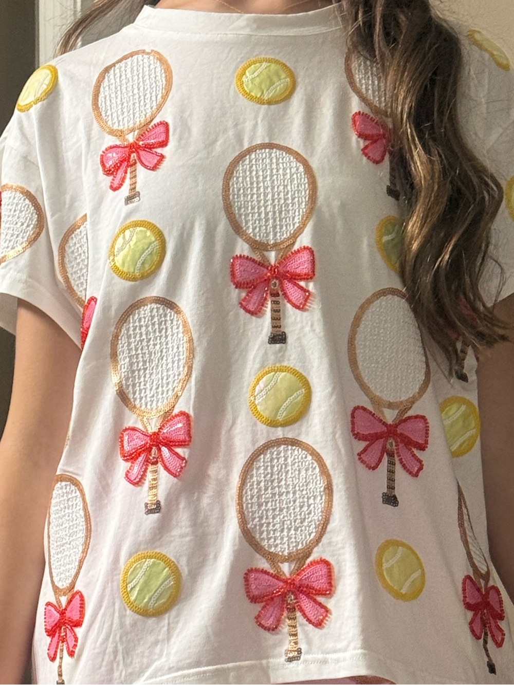 QUEEN OF SPARKLES White Short Sleeve Tee with Pink Bows & Yellow Tennis Balls